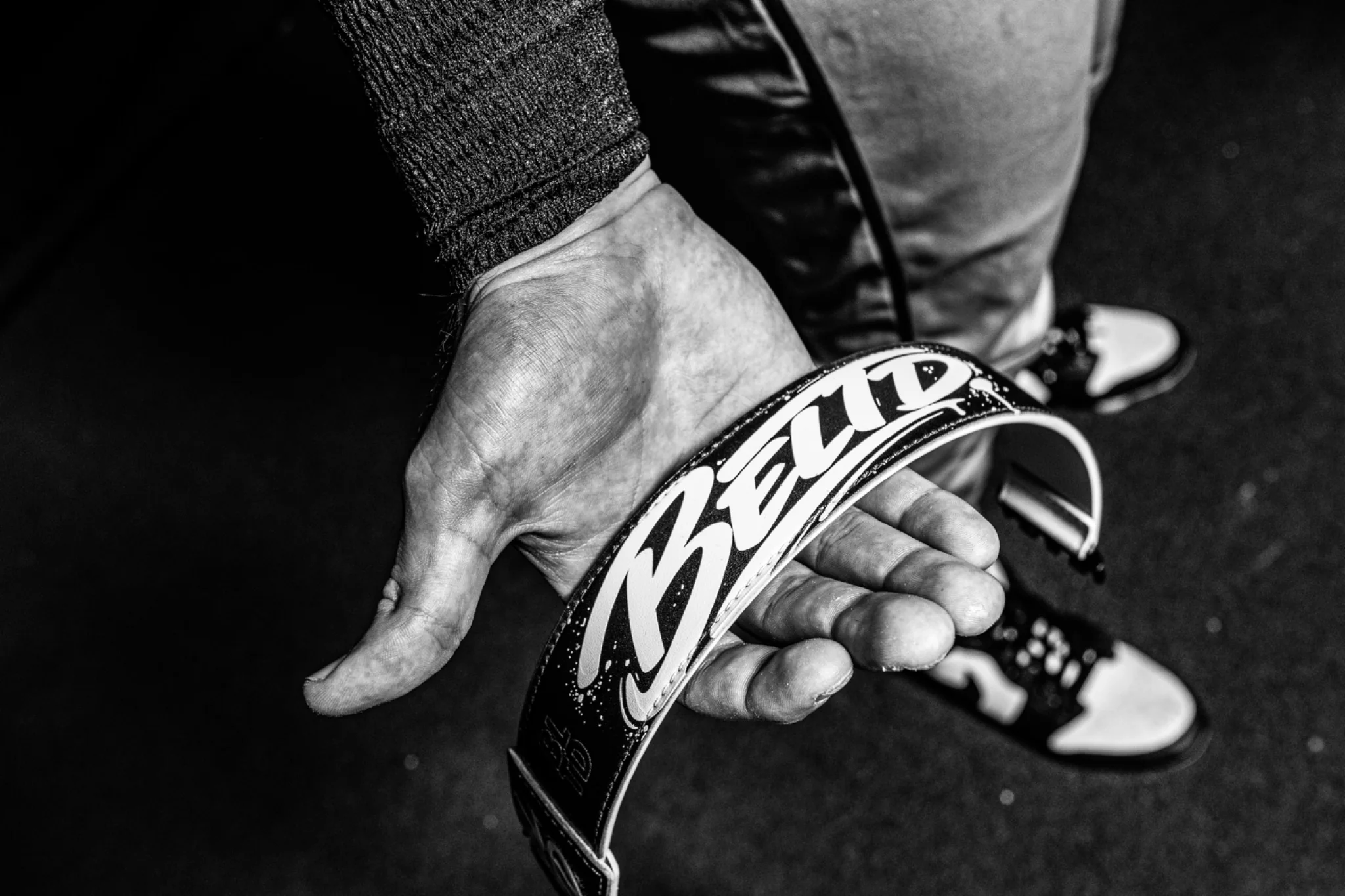Black custom BELTD in hand