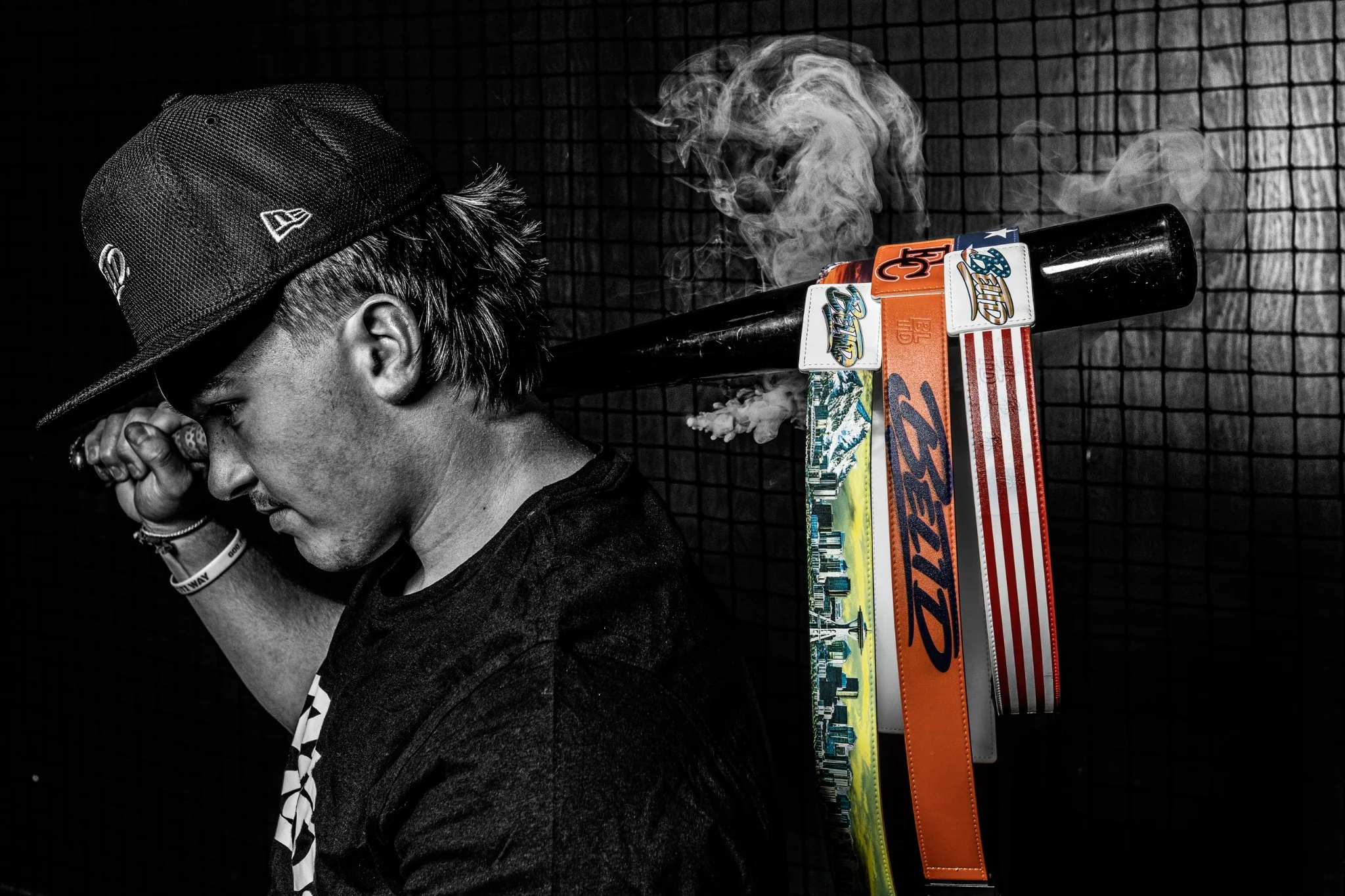 BELTD athlete carrying custom baseball belts on a bat