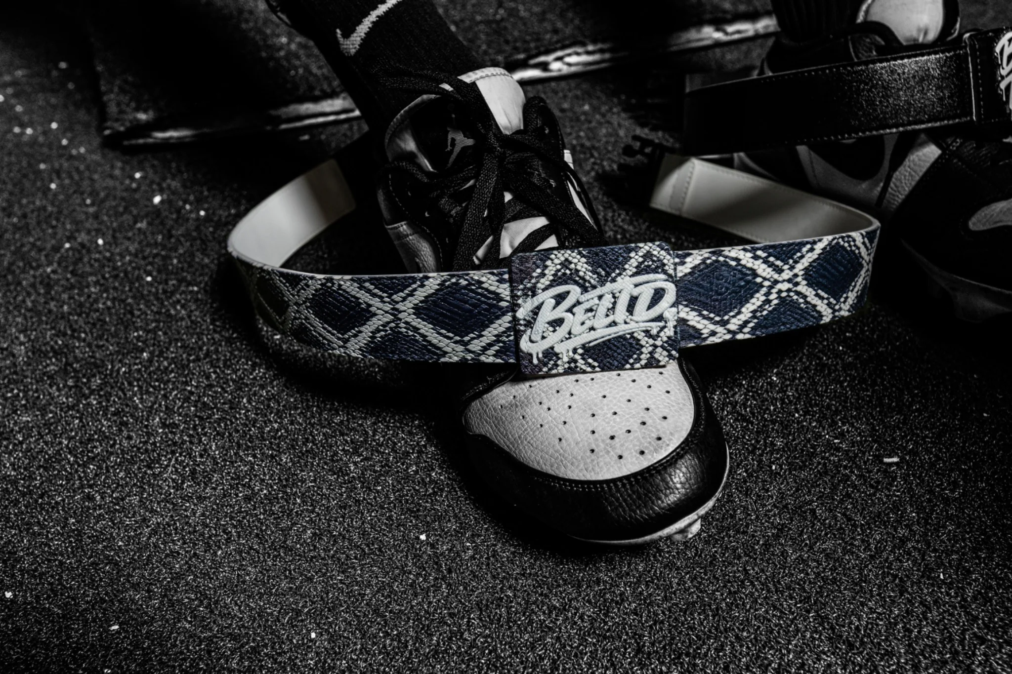 Snake-pattern custom BELTD with baseball cleats